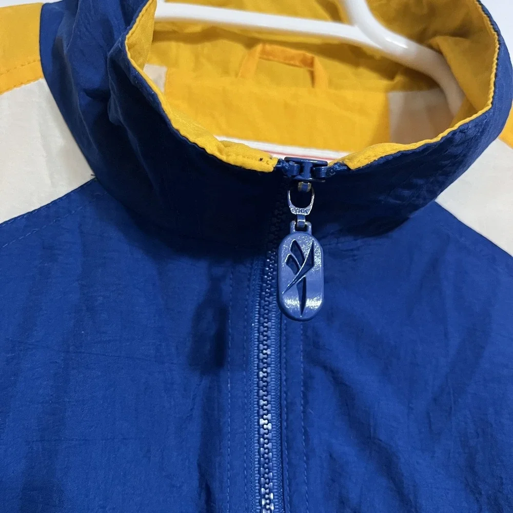 Vintage Reebok UCLA Bruins Nylon Full Zip Windbreaker Jacket unisex MEDIUM Blue